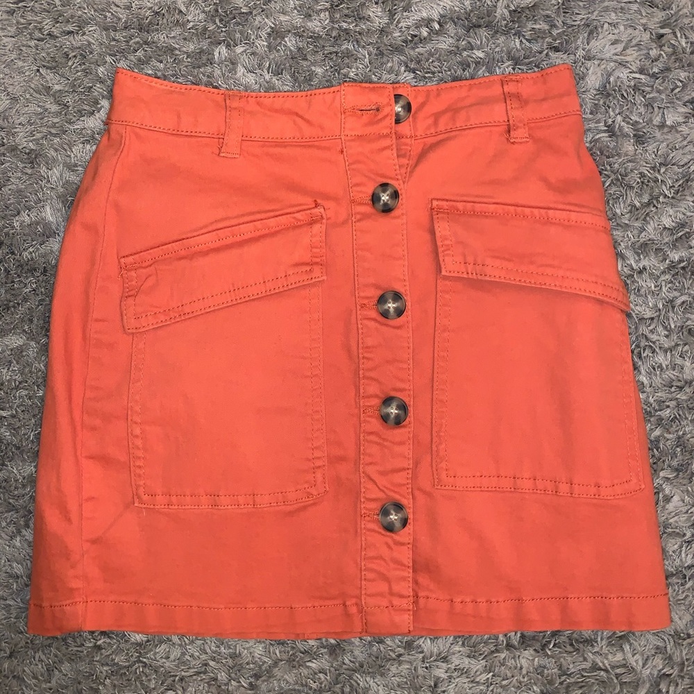 orange skirt with buttons down front